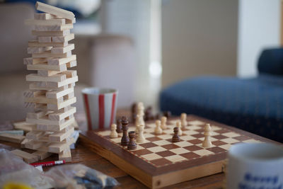 Close-up of chess pieces on table