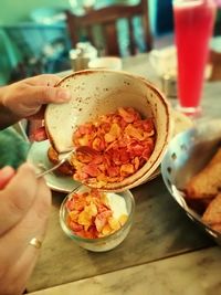 Close-up of hand holding food