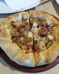 High angle view of pizza in plate on table