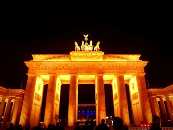 Low angle view of brandenburg gate at night