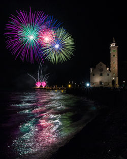 Firework display at night