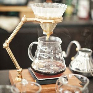 Close-up of coffee maker on table