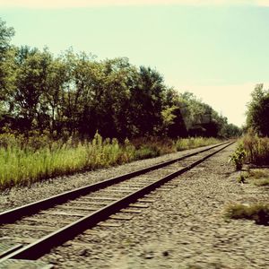 Railroad track against sky