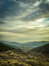 Scenic view of landscape against sky during sunset
