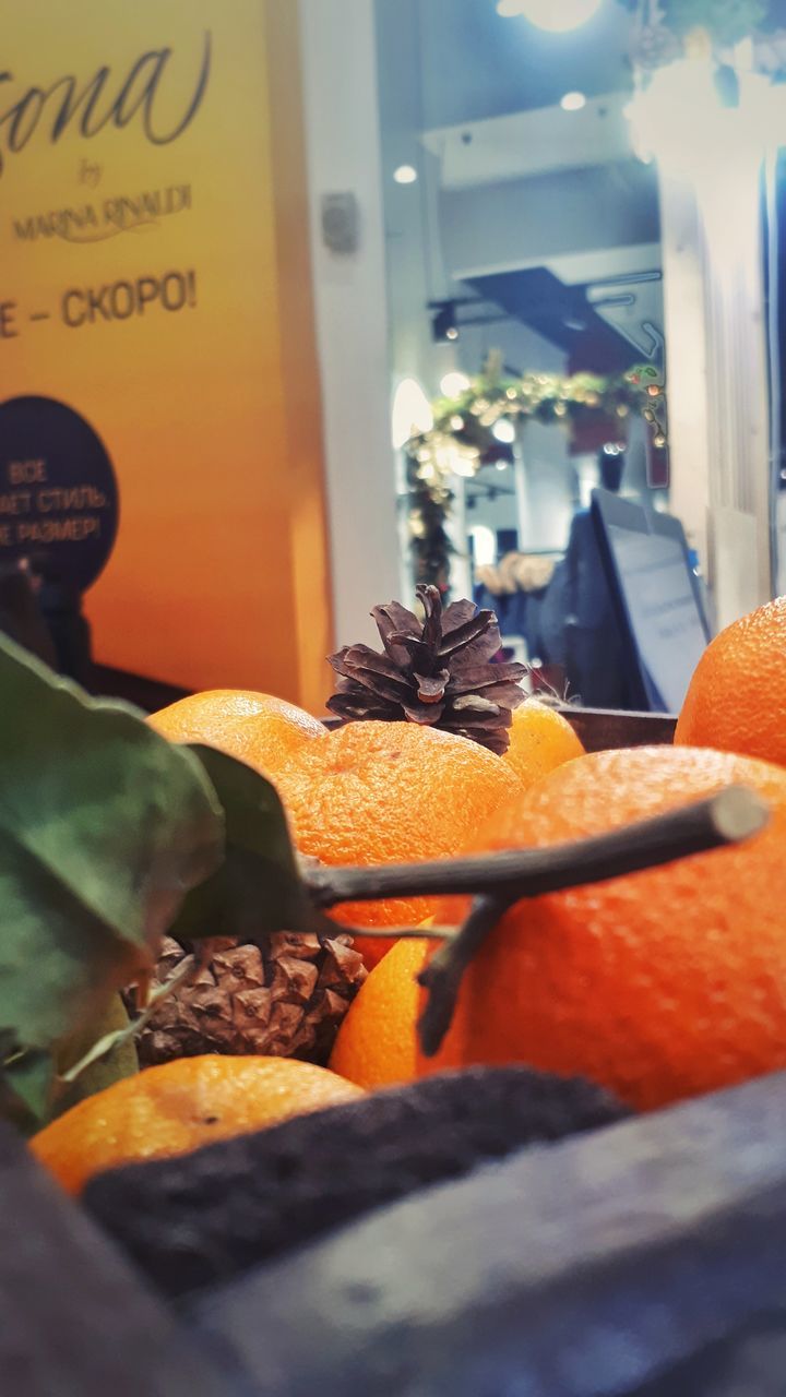 orange color, food and drink, selective focus, indoors, food, no people, fruit, close-up, freshness, pumpkin, day