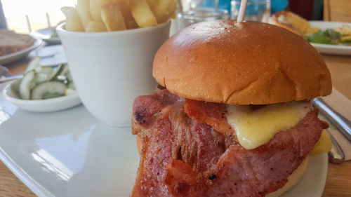Close-up of burger in plate on table