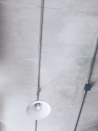 Low angle view of light bulb hanging