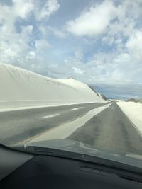 Road seen through car windshield