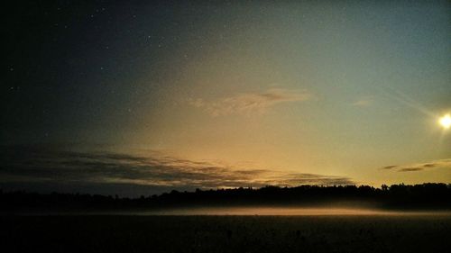 Scenic view of silhouette landscape against sky during sunset