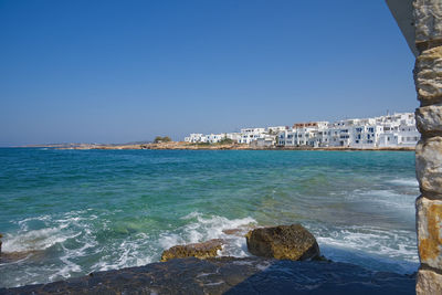 Scenic view of sea against clear blue sky