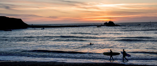 Scenic view of sea at sunset