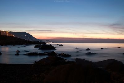 Scenic view of sea against sky during sunset