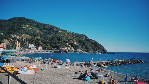 Scenic view of sea against clear blue sky