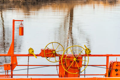 High angle view of cranes by lake