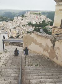 High angle view of people looking at town square