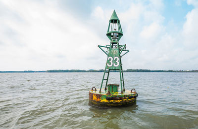 Boat in sea against sky