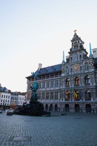 Low angle view of historic building against clear sky