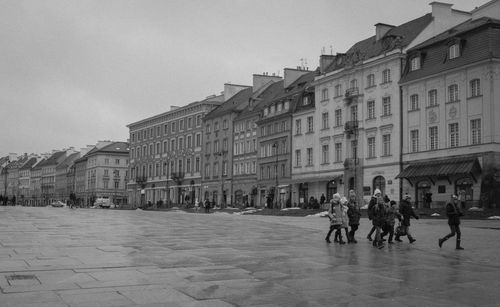 People walking on street in town