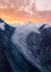 Scenic view of mountains against sky during sunset