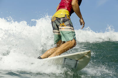 Indonesia, bali, man surfing