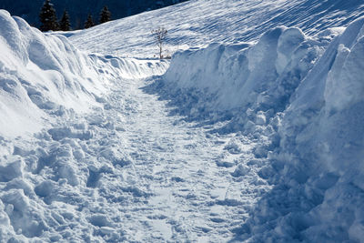 Trail in the snow-covered mountains at winter