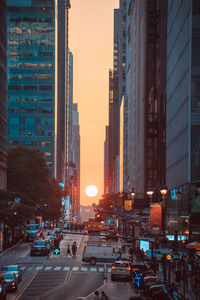 Illuminated city street at night