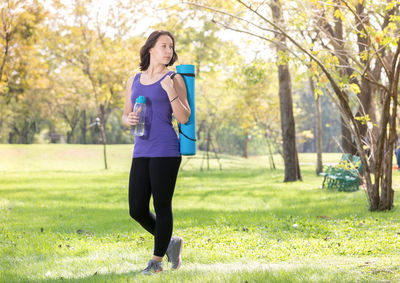 Full length of woman running in park