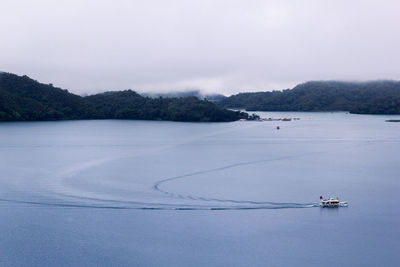 Scenic view of sun moon lake with boat