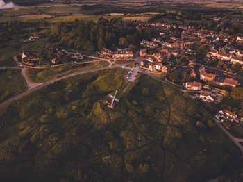 Aerial view of agricultural landscape against sky