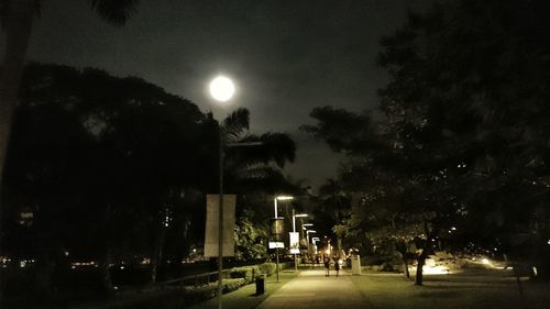 Illuminated street light at night