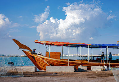 Scenic view of beach against blue sky