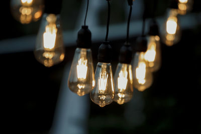 Close-up of illuminated light bulb
