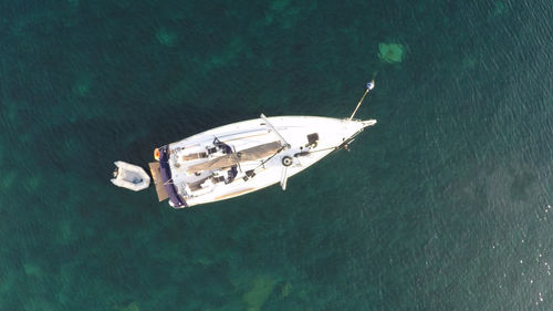 High angle view of sailboat sailing on sea