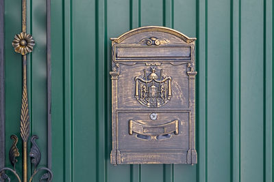 Close-up of sculpture on door