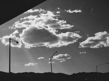 Low angle view of street light against sky