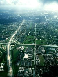 Aerial view of cityscape against sky