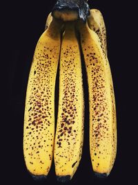 Close-up of bananas against black background