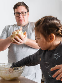 High angle view of boy eating food at home