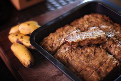 High angle view of meat in cooking pan on table