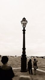 Silhouette of woman against clear sky