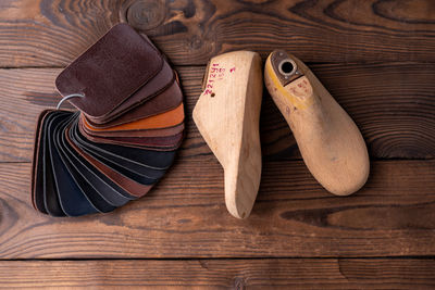 High angle view of shoes on wooden floor