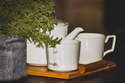 Close-up of coffee cup on table