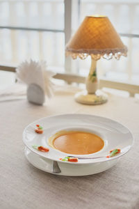 Close-up of tea cup on table