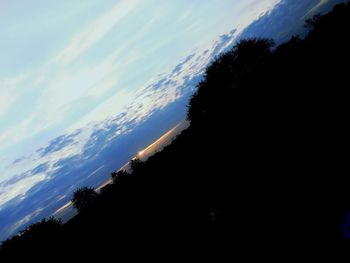 Scenic view of silhouette trees against sky during sunset