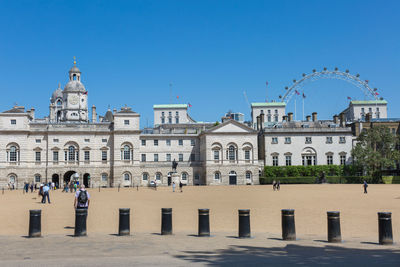 Horse guards, an historic building in the city of westminster with the london eye ferris wheel 