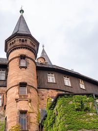 Low angle view of historic building against sky