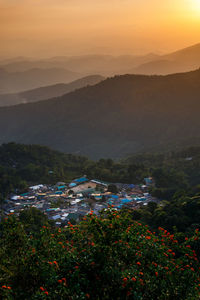 Top landscape of village on doi pui mountains at sunset sky , chiangmai , thailand
