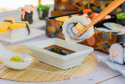 Close-up of sushi served on table