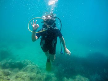 Man swimming in sea