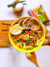 High angle view of food on table - bowl of noodle